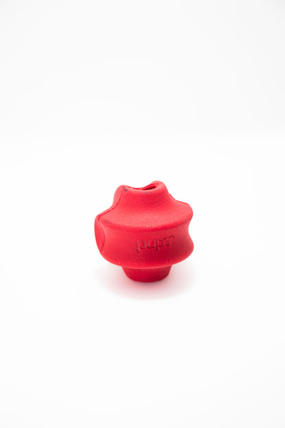 Red dog treat toy  on a white background